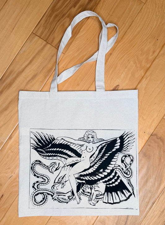 Águila on farmers market tote.